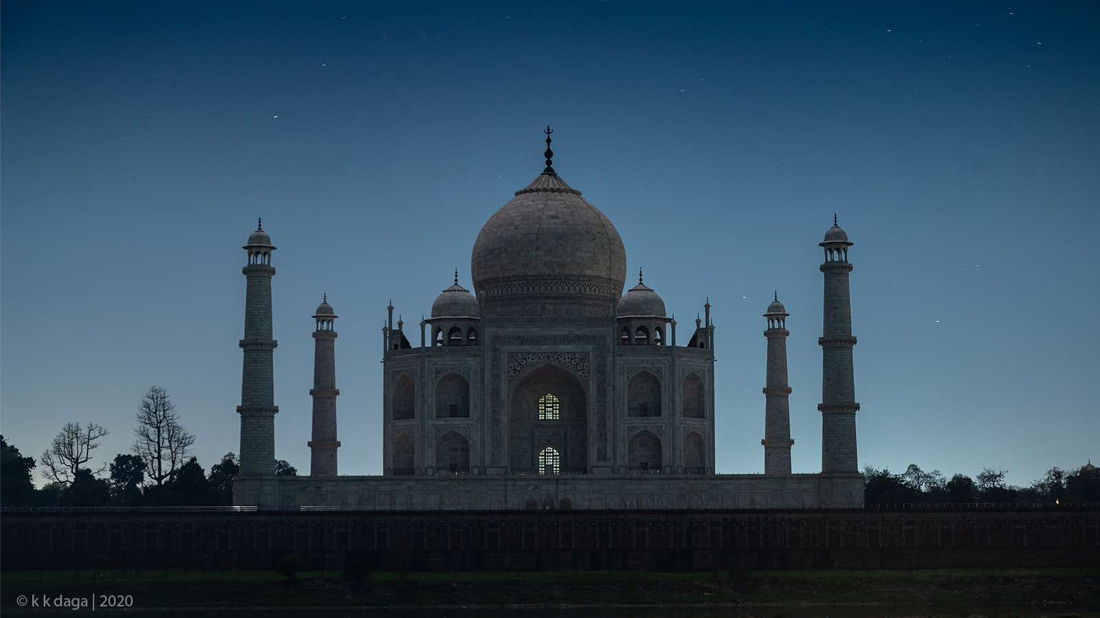 Taj Mahal as seen from Mehtab Bagh under Moonlight